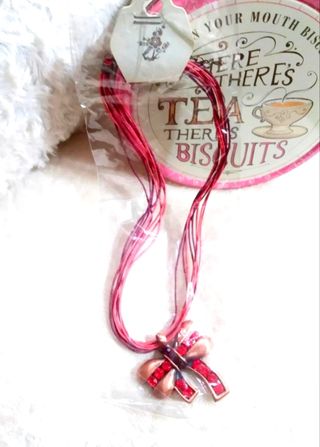 Gargantilla lazo con pedrería roja