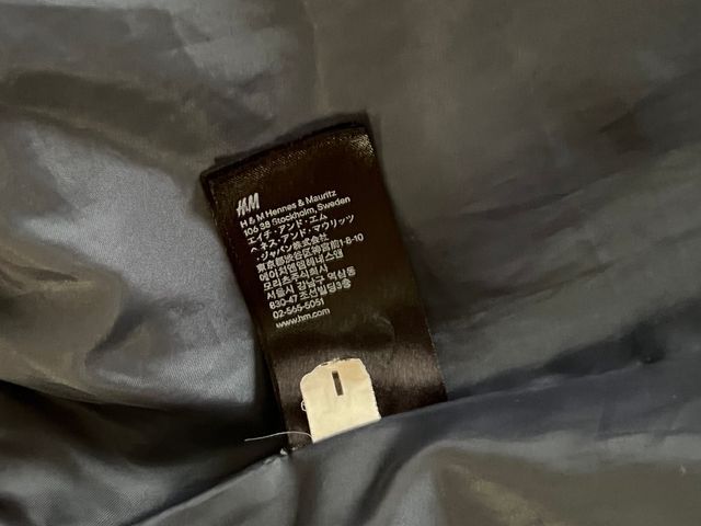 Cazadora azul con cremalleras