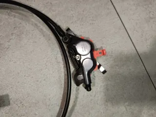 Freno delantero Shimano XT 4 pistones