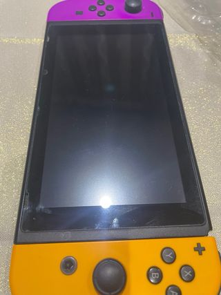 Nintendo Switch + Funda Mario Kart + Mando Pro