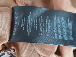 Abito maculato nuovo