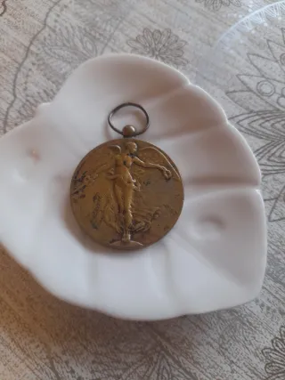 Medalla Arte Belga Ángel