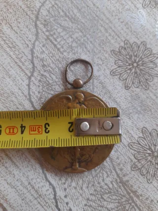 Medalla Arte Belga Ángel