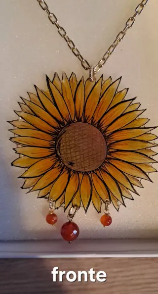 Collana girasole con pietre rosse