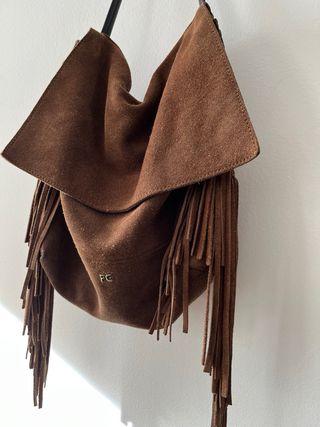 Bolso de piel con flecos