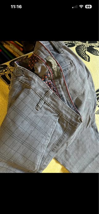 Pantaloni eleganti grigi a quadri