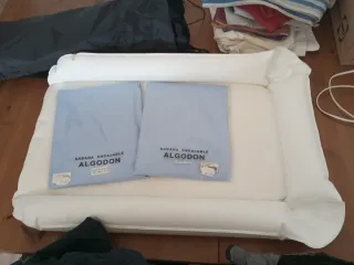 Cambiador y sábanas para cuna