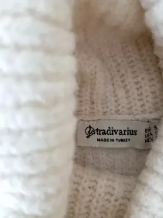 Conjunto jersey cuello alto y pantalón estampado