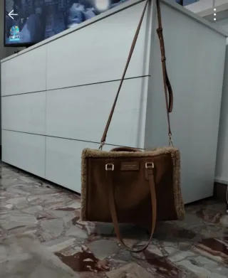 Borsa pelle ed ecopelliccia