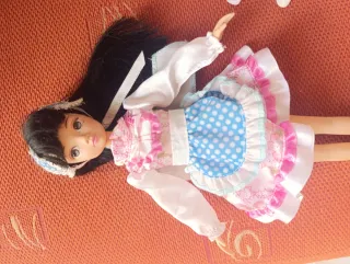 Muñeca KURHN con vestido rosa