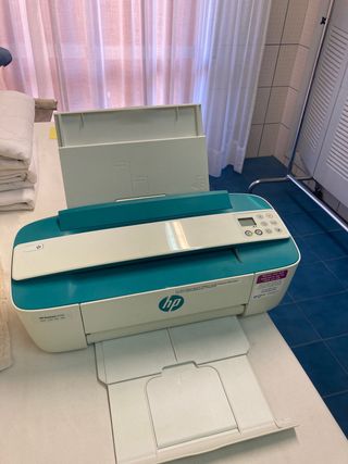 Impresora HP pequeña verde y blanca