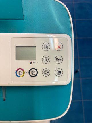 Impresora HP pequeña verde y blanca