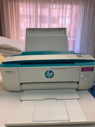 Impresora HP pequeña verde y blanca