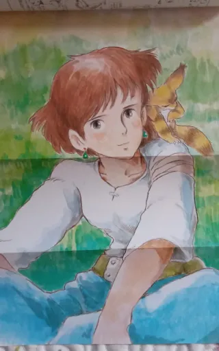Manga japonés Nausicaä Vol. 2 con dos posters.