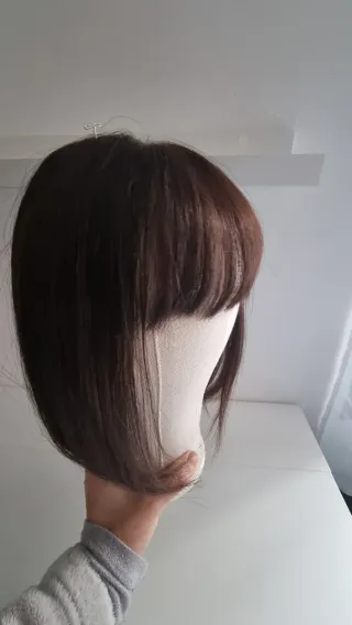 Prótesis capilar castaño