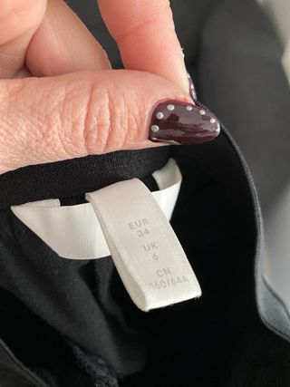 Pantalón H&M negro con raya lateral