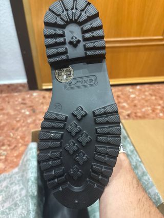 Botas altas UNISA negras mujer