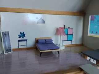 Casita de muñecas de madera