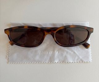 Óculos de Sol Miu Miu Tartaruga