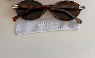 Óculos de Sol Miu Miu Tartaruga redondos