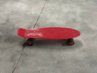 Monopatín rojo para niños