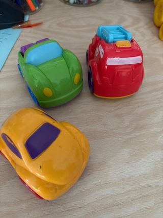 Lote de juguetes caracol y coches.