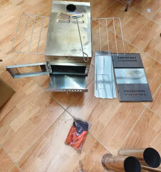 Mini Estufa a leña o carbón metal con ventana .