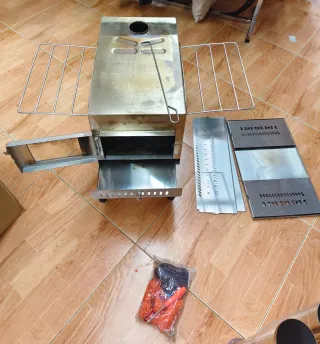 Mini Estufa a leña o carbón metal con ventana .