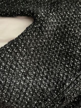 Torera negra con detalles plateados