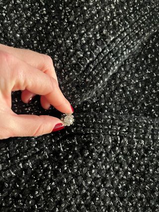 Torera negra con detalles plateados