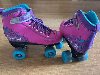 Patines de 4 ruedas rosas y morados