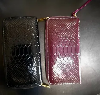Carteras de mano elegantes (negras y moradas)