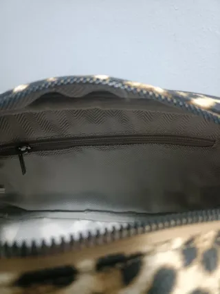 Bolso animal print. Con etiqueta