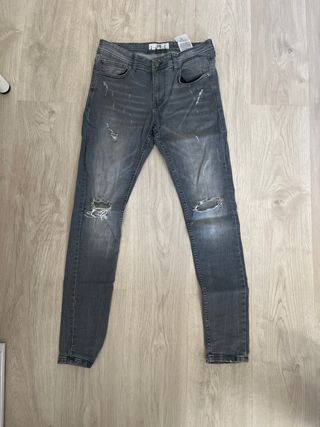 Vaqueros Skinny Gris Desgastados