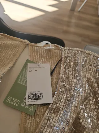 Mono corto H&M lentejuelas fiesta dorado