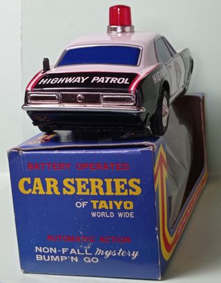 Coche de policía Taiyo Bump'n Go de chapa