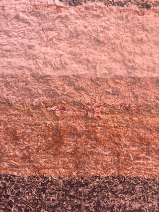 Alfombra tipo jarapa beige y marrón