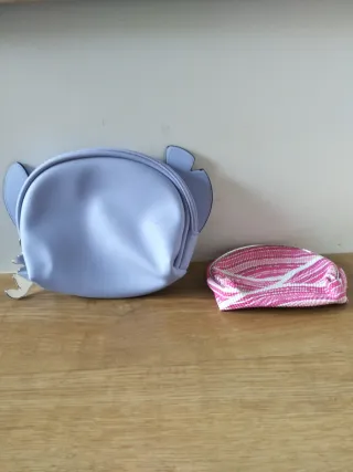 Pochette Stitch e portamonete rosa