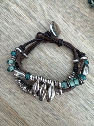 Conjunto Uno de 50: Collar, Pulsera y Pendientes