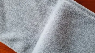 Bufanda, azul y blanca de forro polar