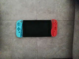 Nintendo Switch + Juegos y Accesorios