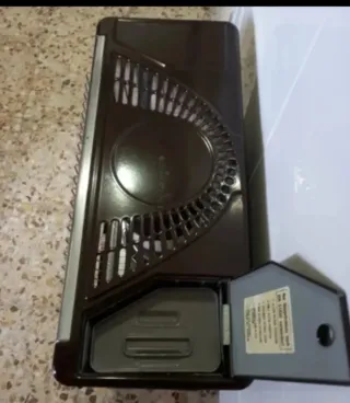 Estufa de queroseno marrón