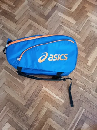 Paletero Asics azul y naranja