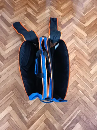 Paletero Asics azul y naranja