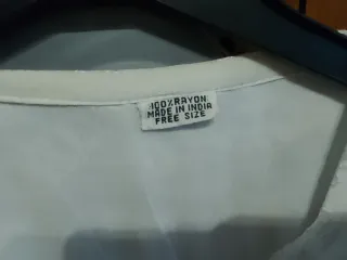 Camicia bianca estiva ricamata