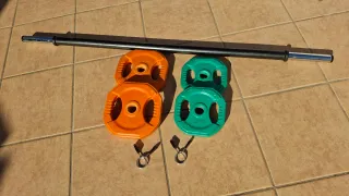 Barra de pesas con discos y cierres