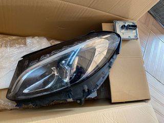Faro delantero con golpe clase c 2016