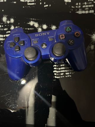 PlayStation 3 con mandos y cable