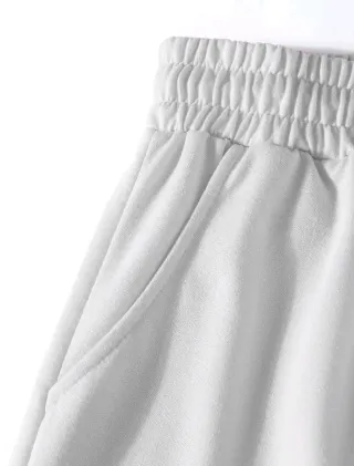 Pantalón deportivo ancho blanco