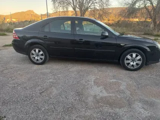 Vespinos t max 500. gl.sc mobyllete .Ford mondeo